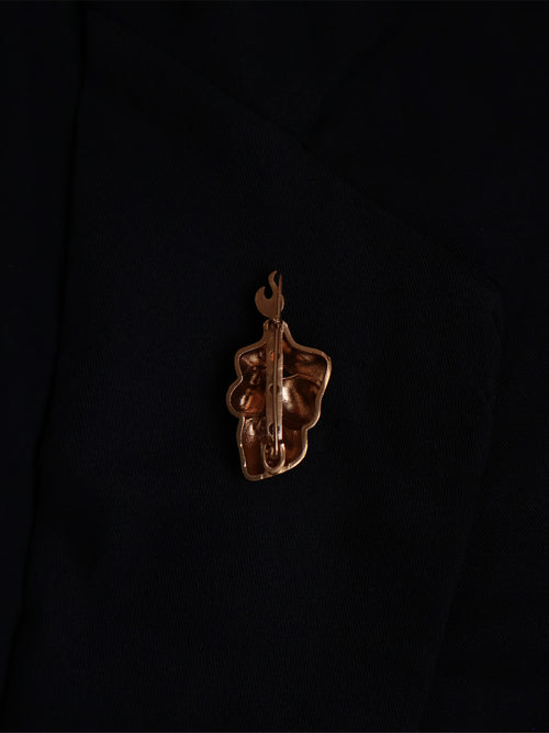 The bare bust - brooch